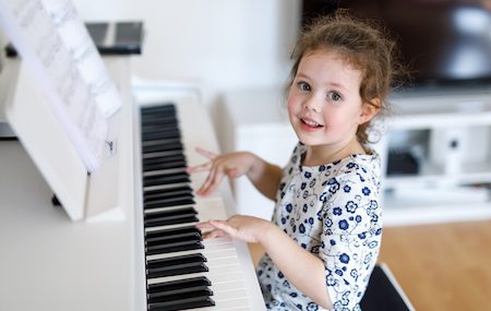 Piano or Technology? Which Offers Your Child More Benefits?