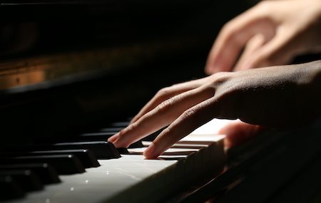 Do You Really Need Weighted Keys To Learn The Piano?