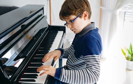 How Piano Lessons Enhance Cognitive Development in Children